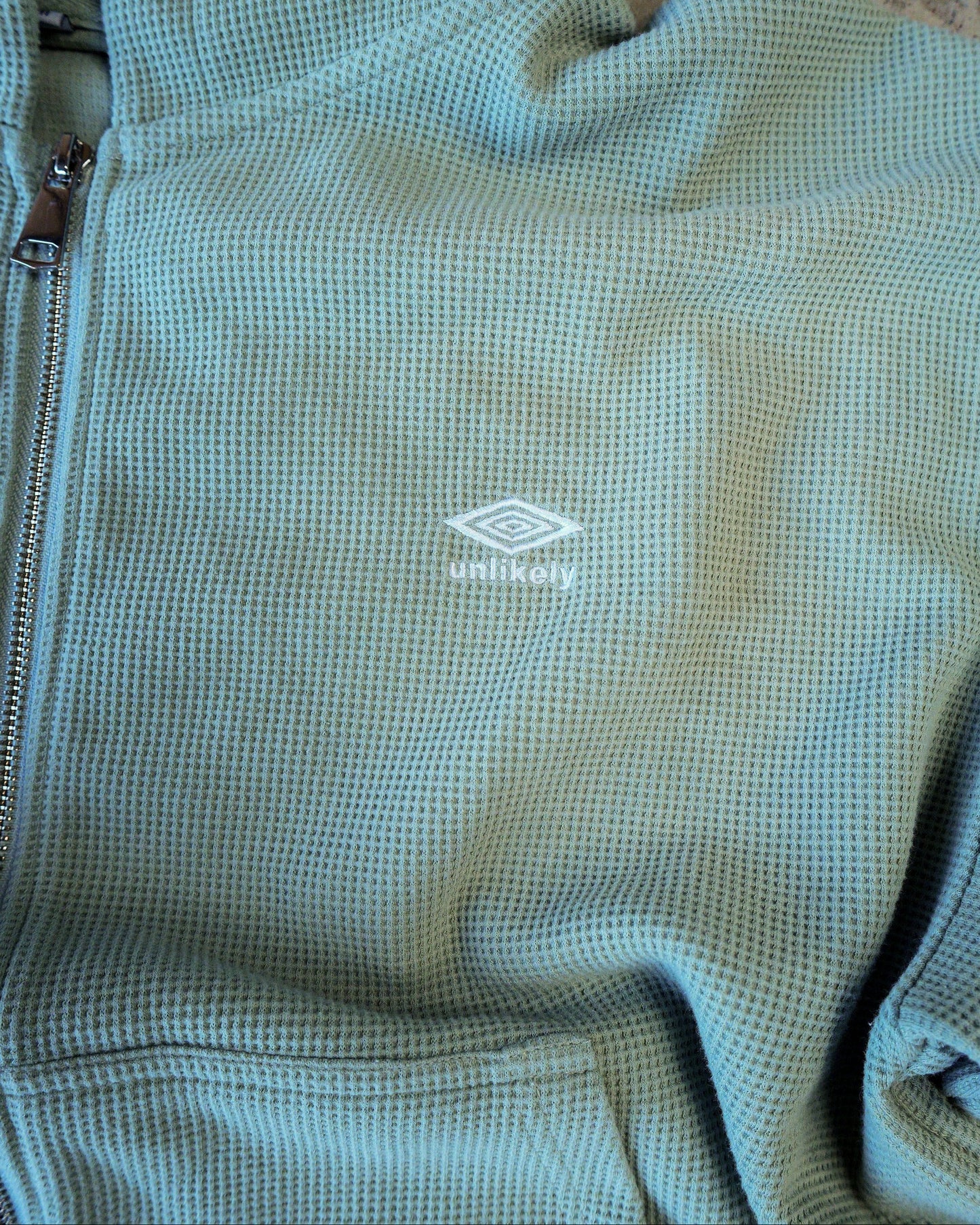 mint green faded suit